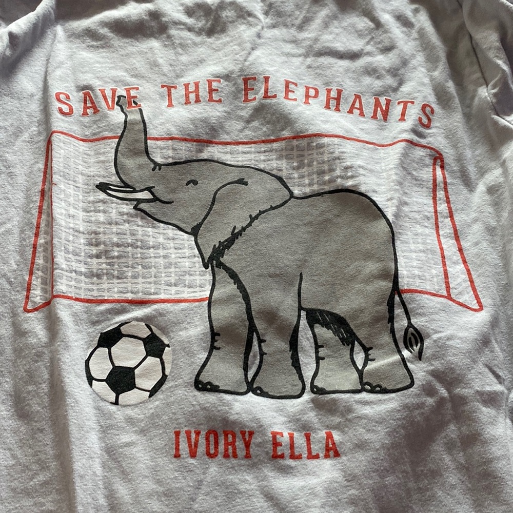 This is a ivory ella never worn long sleeve shirt